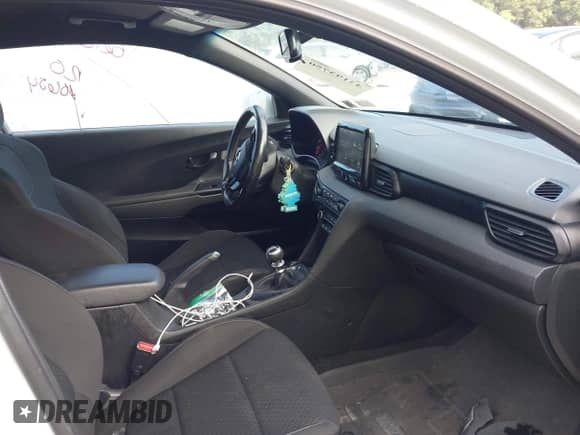 2019 Hyundai Veloster N z VIN KMHT36AH0KU001538, wystawiony jako IAAI lot #43193750 z przebiegiem 61 712 mil mil oraz . Historia ofert i sprzedaży dostępna na DreamBid. Obrazek 5.