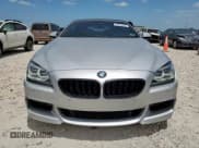 ✅ 2013 BMW 6 Series 650i • VIN: WBAYP9C58DDW21248 • Лот: 63510565. Опубликован ранее на Copart с пробегом 34 924 миль. Бесплатный доступ к архиву аукционных продаж из США и подробный отчёт об истории автомобиля на DreamBid. Изображение 5.