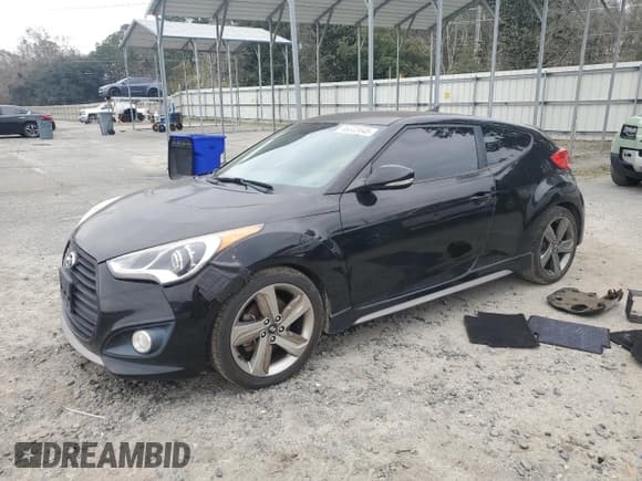 ✅ 2015 Hyundai Veloster Turbo • VIN: KMHTC6AE1FU240608 • Lot: 46003445. Wystawiony na Copart z przebiegiem 104 300 mil. Bezpłatny archiwum sprzedaży aukcyjnych z USA i szczegółowy raport historii pojazdu na DreamBid. Zdjęcie 1.
