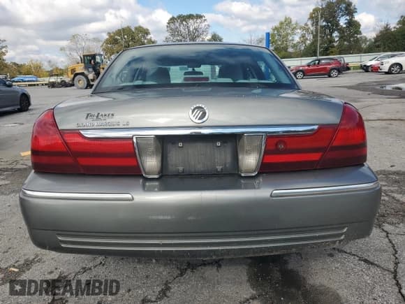 ✅ 2003 Mercury Grand Marquis LS Premium • VIN: 2MEFM75W73X699958 • Lot: 90725825. Listed on Copart with 89,520 mi. Free auction sales archive from the USA and detailed vehicle history report at DreamBid. Image 6.