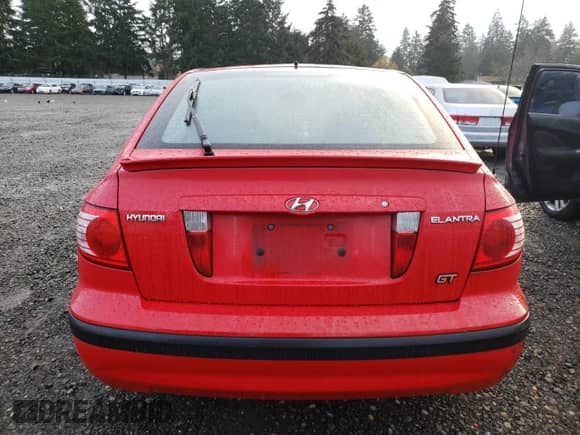 2004 Hyundai Elantra GT z VIN KMHDN56D34U104583, wystawiony jako Copart lot #82441094 z przebiegiem Nie podano mil oraz Szkoda całkowita • Salvage title. Historia ofert i sprzedaży dostępna na DreamBid. Obrazek 6.