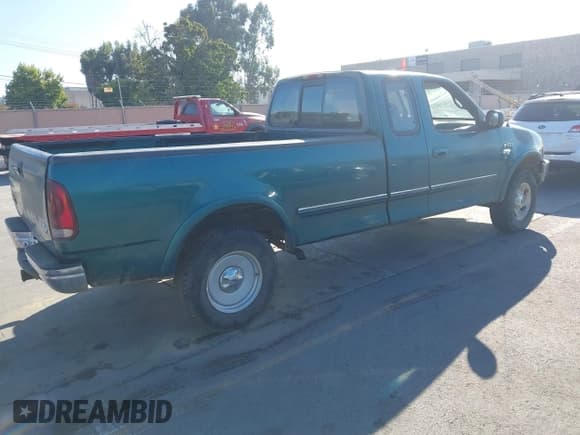 ✅ 1997 Ford F-150 XL • VIN: 1FTDX1861VKA99001 • Lot: 43214637. Listed on IAAI with 201,282 mi. Free auction sales archive from the USA and detailed vehicle history report at DreamBid. Image 4.