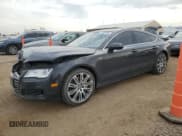 ✅ 2014 Audi A7 Premium Plus • VIN: WAUWGAFCXEN018266 • Лот: 69325185. Опубликован ранее на Copart с пробегом 200 046 миль. Бесплатный доступ к архиву аукционных продаж из США и подробный отчёт об истории автомобиля на DreamBid. Изображение 1.