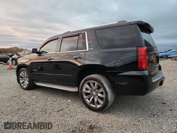 ✅ 2015 Chevrolet Tahoe LTZ • VIN: 1GNSCCKC5FR170309 • Lot: 92989885. Listed on Copart with 160,418 mi. Free auction sales archive from the USA and detailed vehicle history report at DreamBid. Image 2.
