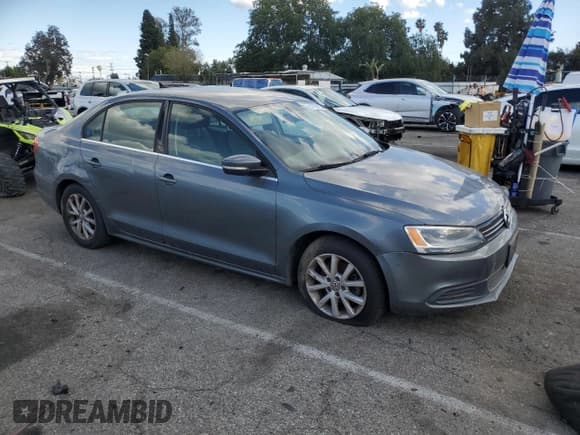 ✅ 2013 Volkswagen Jetta SE • VIN: 3VWDP7AJ8DM360372 • Lot: 51796725. Listed on Copart with 66,981 mi. Free auction sales archive from the USA and detailed vehicle history report at DreamBid. Image 4.