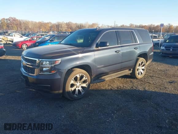 2018 Chevrolet Tahoe LT z VIN 1GNSKBKC7JR377564, wystawiony jako IAAI lot #43575752 z przebiegiem 153 789 mil mil oraz . Historia ofert i sprzedaży dostępna na DreamBid. Obrazek 2.