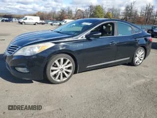 ✅ 2013 Hyundai Azera • VIN: KMHFH4JG9DA221002 • Лот: 90937405. Опубликован ранее на Copart с пробегом 164 253 миль. Бесплатный доступ к архиву аукционных продаж из США и подробный отчёт об истории автомобиля на DreamBid. Изображение 1.