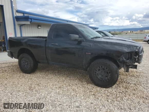 2017 Ram 1500 Tradesman with VIN 3C6JR7AT5HG641090, listed as a Copart auction lot 66348694 with 100,711 mi miles and Salvage title. Bid and sale history available at DreamBid. Image 4.