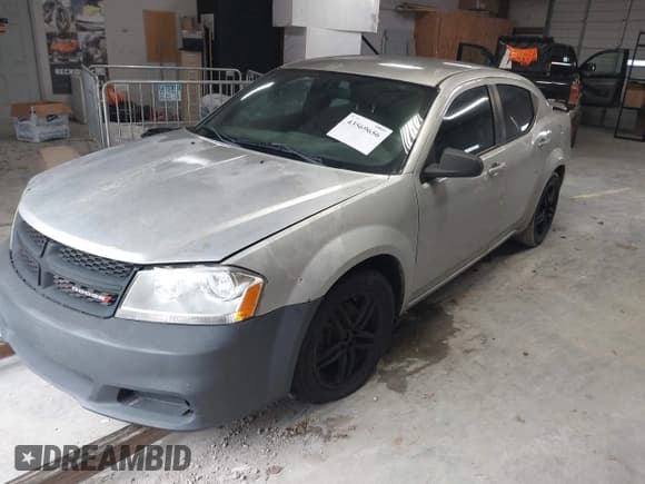 ✅ 2012 Dodge Avenger SE • VIN: 1C3CDZAB4CN215981 • Lot: 43569656. Listed on IAAI with 134,833 mi. Free auction sales archive from the USA and detailed vehicle history report at DreamBid. Image 2.