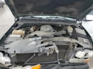 ✅ 2003 Chevrolet Suburban LT • VIN: 3GNEC16Z93G288228 • Лот: 43798875. Опубликован ранее на Copart с пробегом 270 859 миль. Бесплатный доступ к архиву аукционных продаж из США и подробный отчёт об истории автомобиля на DreamBid. Изображение 12.