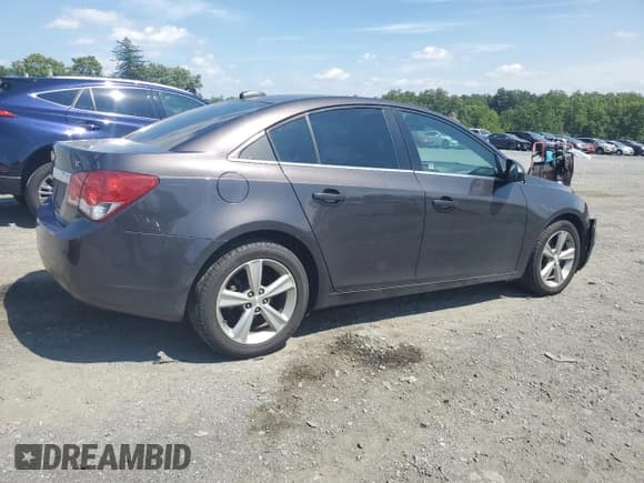 ✅ 2015 Chevrolet Cruze LT • VIN: 1G1PE5SB4F7214428 • Lot: 63314663. Listed on Copart with 127,787 mi. Free auction sales archive from the USA and detailed vehicle history report at DreamBid. Image 3.