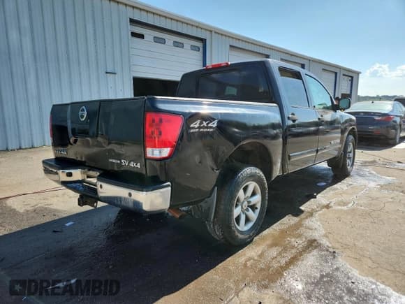 ✅ 2012 Nissan Titan SL • VIN: 1N6BA0EC6CN323594 • Lot: 64273555. Listed on Copart with 273,165 mi. Free auction sales archive from the USA and detailed vehicle history report at DreamBid. Image 3.