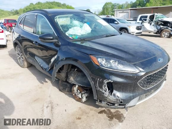 ✅ 2020 Ford Escape Titanium • VIN: 1FMCU9J96LUA72557 • Lot: 42204154. Listed on IAAI with 100 mi. Free auction sales archive from the USA and detailed vehicle history report at DreamBid. Image 1.