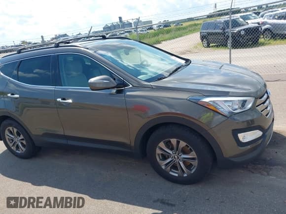 ✅ 2014 Hyundai Santa Fe • VIN: 5XYZUDLB1EG227778 • Lot: 43033757. Listed on IAAI with 135,496 mi. Free auction sales archive from the USA and detailed vehicle history report at DreamBid. Image 13.