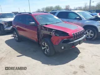 ✅ 2016 Jeep Cherokee Trailhawk • VIN: 1C4PJMBS9GW237059 • Lot: 42079788. Listed on IAAI with 114,513 mi. Free auction sales archive from the USA and detailed vehicle history report at DreamBid. Image 1.