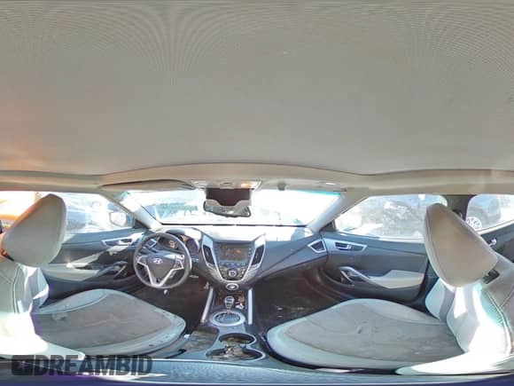 2012 Hyundai Veloster w/Red Int z VIN KMHTC6AD5CU030242, wystawiony jako Copart lot #83016604 z przebiegiem 142 555 mil mil oraz Szkoda całkowita • Salvage title. Historia ofert i sprzedaży dostępna na DreamBid. Obrazek 14.