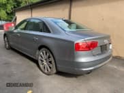 ✅ 2011 Audi A8 • VIN: WAURVAFD7BN018734 • Lot: 85905595. Wystawiony na Copart z przebiegiem 79 694 mil. Bezpłatny archiwum sprzedaży aukcyjnych z USA i szczegółowy raport historii pojazdu na DreamBid. Zdjęcie 3.