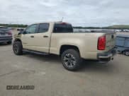 ✅ 2021 Chevrolet Colorado 4WD Z71 • VIN: 1GCGTDEN6M1289449 • Lot: 71902635. Listed on Copart with 57,528 mi. Free auction sales archive from the USA and detailed vehicle history report at DreamBid. Image 2.