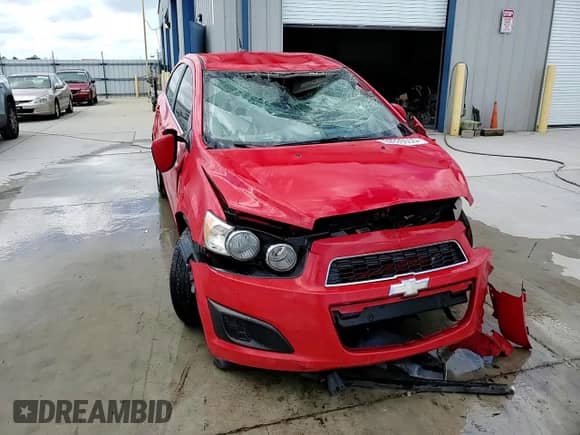 2014 Chevrolet Sonic LT z VIN 1G1JC5SH5E4196988, wystawiony jako Copart lot #69935555 z przebiegiem Nie podano mil oraz Szkoda całkowita • Salvage title. Historia ofert i sprzedaży dostępna na DreamBid. Obrazek 14.