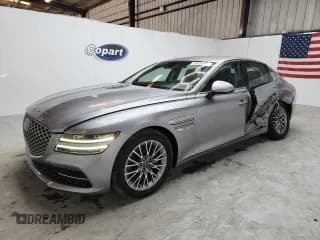 ✅ 2023 Genesis G80 2.5T • VIN: KMTGB4SC1PU197224 • Лот: 86997105. Опубликован ранее на Copart с пробегом 56 250 миль. Бесплатный доступ к архиву аукционных продаж из США и подробный отчёт об истории автомобиля на DreamBid. Изображение 1.