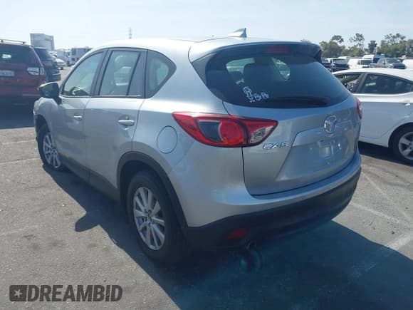 ✅ 2016 Mazda CX-5 Sport • VIN: JM3KE2BY4G0845816 • Lot: 42333248. Listed on IAAI with 48,504 mi. Free auction sales archive from the USA and detailed vehicle history report at DreamBid. Image 3.