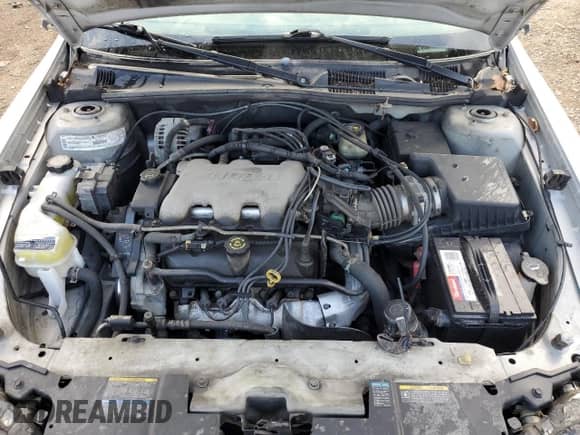 2002 Chevrolet Malibu LS z VIN 1G1NE52J62M592860, wystawiony jako Copart lot #82667534 z przebiegiem 91 706 mil mil oraz Szkoda całkowita • Salvage title. Historia ofert i sprzedaży dostępna na DreamBid. Obrazek 11.