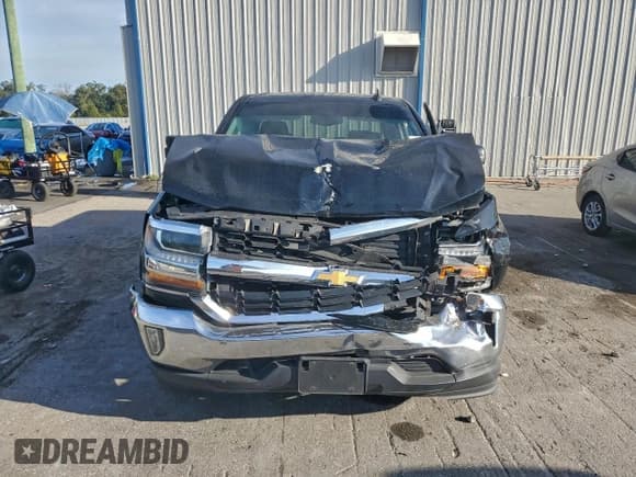 ✅ 2018 Chevrolet Silverado 1500 LT • VIN: 3GCPCREC9JG645806 • Lot: 94570555. Wystawiony na Copart z przebiegiem 214 690 mil. Bezpłatny archiwum sprzedaży aukcyjnych z USA i szczegółowy raport historii pojazdu na DreamBid. Zdjęcie 5.