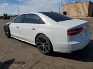 ✅ 2017 Audi A8 Sport • VIN: WAU43AFD5HN020930 • Lot: 70952495. Wystawiony na Copart z przebiegiem 149 246 mil. Bezpłatny archiwum sprzedaży aukcyjnych z USA i szczegółowy raport historii pojazdu na DreamBid. Zdjęcie 2.