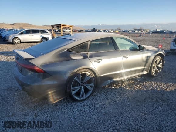 ✅ 2021 Audi RS 7 • VIN: WUAPCBF29MN906928 • Лот: 88170785. Опубликован ранее на Copart с пробегом 22 210 миль. Бесплатный доступ к архиву аукционных продаж из США и подробный отчёт об истории автомобиля на DreamBid. Изображение 3.