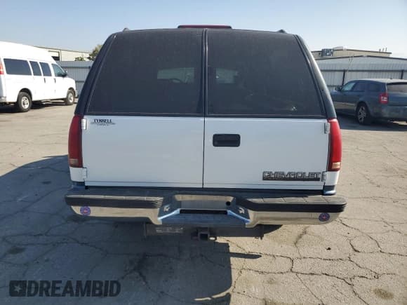 ✅ 1997 Chevrolet Suburban • VIN: 1GNFK16R1VJ339214 • Lot: 85410875. Wystawiony na Copart z przebiegiem 158 297 mil. Bezpłatny archiwum sprzedaży aukcyjnych z USA i szczegółowy raport historii pojazdu na DreamBid. Zdjęcie 6.