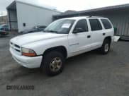 ✅ 2001 Dodge Durango • VIN: 1B4HS28Z21F570959 • Lot: 43698509. Listed on IAAI with 185,043 mi. Free auction sales archive from the USA and detailed vehicle history report at DreamBid. Image 2.