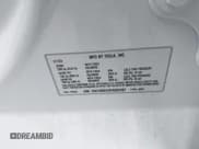 ✅ 2023 Tesla Model Y Long Range • VIN: 7SAYGDEE3PA055497 • Lot: 42396529. Listed on IAAI with 18,230 mi. Free auction sales archive from the USA and detailed vehicle history report at DreamBid. Image 9.