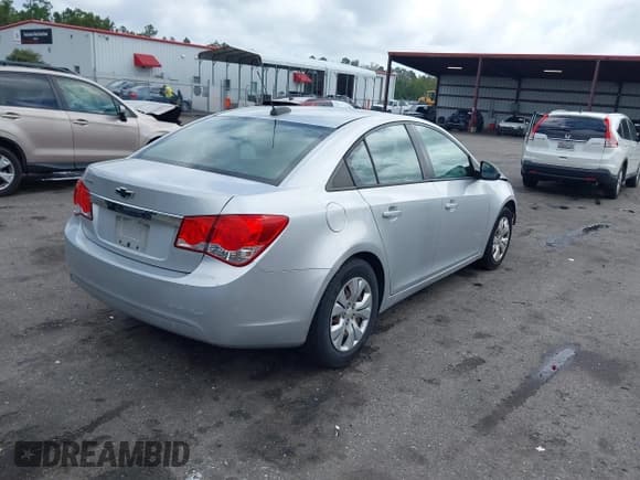 ✅ 2016 Chevrolet Cruze LS • VIN: 1G1PC5SH3G7183040 • Lot: 43364153. Listed on IAAI with 90,696 mi. Free auction sales archive from the USA and detailed vehicle history report at DreamBid. Image 4.
