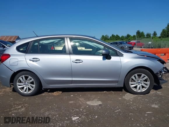 ✅ 2016 Subaru Impreza Premium • VIN: JF1GPAB65G8270778 • Lot: 42891616. Listed on IAAI with 77,071 mi. Free auction sales archive from the USA and detailed vehicle history report at DreamBid. Image 13.