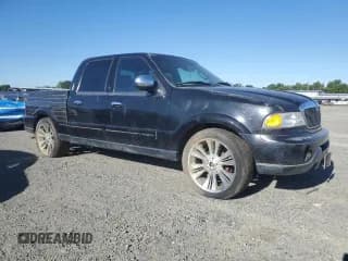 ✅ 2002 Lincoln Blackwood • VIN: 5LTEW05A42KJ02248 • Лот: 56076795. Опубликован ранее на Copart с пробегом Не указан. Бесплатный доступ к архиву аукционных продаж из США и подробный отчёт об истории автомобиля на DreamBid. Изображение 4.