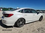 ✅ 2022 Honda Civic Touring • VIN: 2HGFE1F93NH307951 • Лот: 82345935. Опубликован ранее на Copart с пробегом 61 323 миль. Бесплатный доступ к архиву аукционных продаж из США и подробный отчёт об истории автомобиля на DreamBid. Изображение 3.