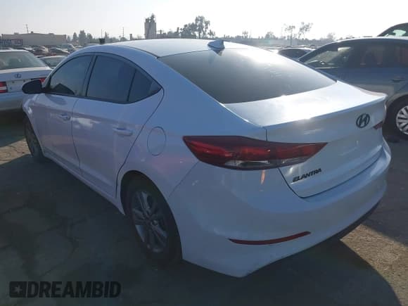 ✅ 2018 Hyundai Elantra Limited • VIN: 5NPD84LF3JH294354 • Lot: 43561118. Listed on IAAI with 96,957 mi. Free auction sales archive from the USA and detailed vehicle history report at DreamBid. Image 3.