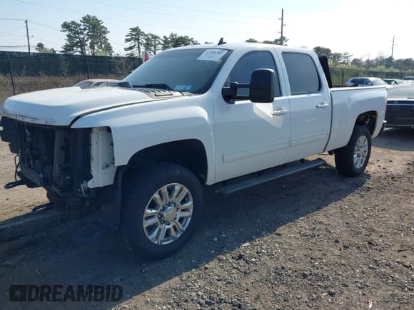 ✅ 2014 Chevrolet Silverado 2500HD LT • VIN: 1GC1KXCG1EF122256 • Lot: 42109783. Listed on IAAI with 152,052 mi. Free auction sales archive from the USA and detailed vehicle history report at DreamBid. Image 21.