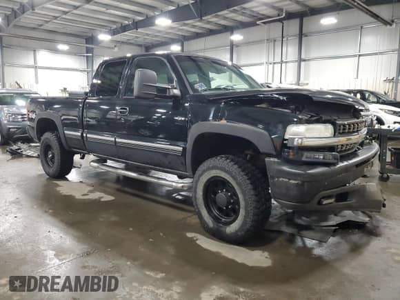 2000 Chevrolet Silverado 2500 LT с VIN 1GCGK29U5YE141509, выставлен на аукционе Copart как лот 52498205 с пробегом 217 794 миль миль и Списание • Salvage title. История ставок и продаж доступна на DreamBid. Изображение 4.