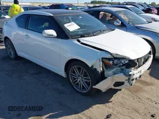 ✅ 2012 Scion tC • VIN: JTKJF5C70C3042804 • Lot: 41082925. Wystawiony na IAAI z przebiegiem 138 257 mil. Bezpłatny archiwum sprzedaży aukcyjnych z USA i szczegółowy raport historii pojazdu na DreamBid. Zdjęcie 1.