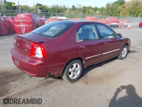 ✅ 2002 Kia Spectra GS • VIN: KNAFB161X25068285 • Lot: 43350420. Listed on IAAI with 73,116 mi. Free auction sales archive from the USA and detailed vehicle history report at DreamBid. Image 4.