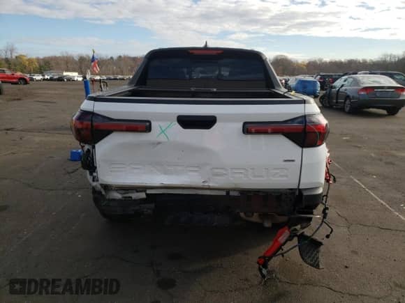 2022 Hyundai Santa Cruz SEL z VIN 5NTJCDAE8NH027701, wystawiony jako Copart lot #81574174 z przebiegiem 65 414 mil mil oraz Szkoda całkowita • Salvage title. Historia ofert i sprzedaży dostępna na DreamBid. Obrazek 6.