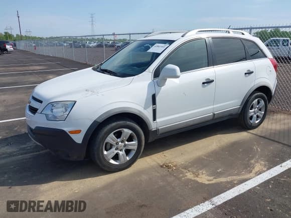 ✅ 2014 Chevrolet Captiva Sport LS • VIN: 3GNAL2EK0ES603331 • Lot: 42061441. Wystawiony na IAAI z przebiegiem 128 041 mil. Bezpłatny archiwum sprzedaży aukcyjnych z USA i szczegółowy raport historii pojazdu na DreamBid. Zdjęcie 2.