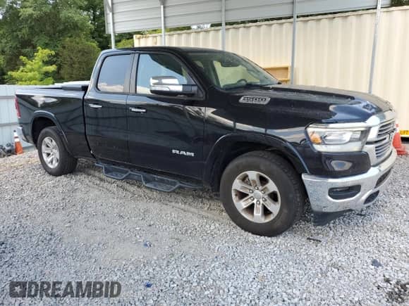 2020 Ram 1500 Laramie with VIN 1C6RREDT9LN294754, listed as a Copart auction lot 60804234 with 57,595 mi miles and Salvage title. Bid and sale history available at DreamBid. Image 4.