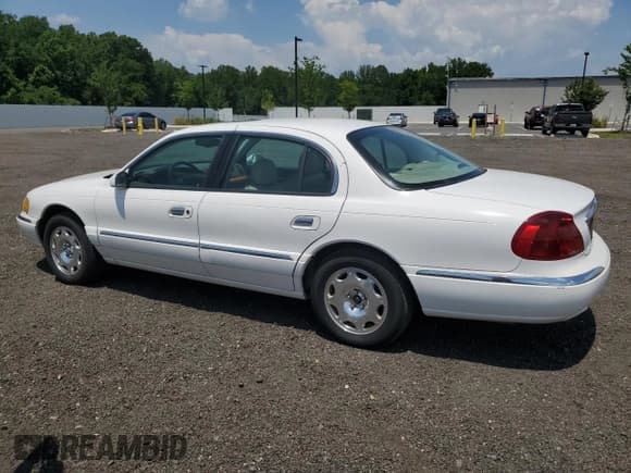 ✅ 2002 Lincoln Continental • VIN: 1LNHM97V12Y659007 • Lot: 62300975. Listed on Copart with 90,182 mi. Free auction sales archive from the USA and detailed vehicle history report at DreamBid. Image 2.