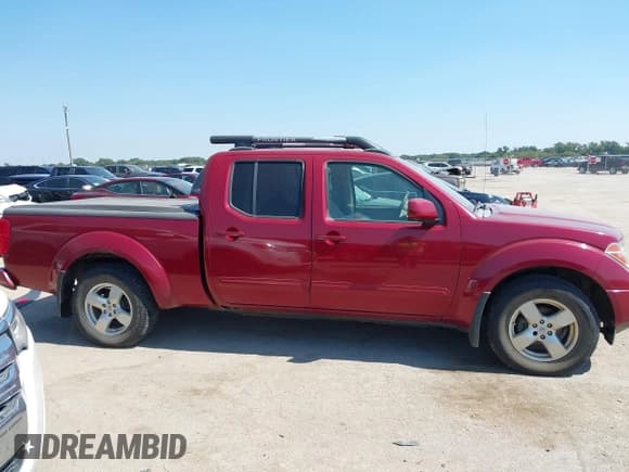 ✅ 2007 Nissan Frontier SE • VIN: 1N6AD09W67C433618 • Lot: 43351679. Listed on IAAI with 245,686 mi. Free auction sales archive from the USA and detailed vehicle history report at DreamBid. Image 13.