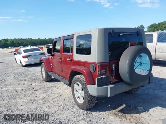 ✅ 2007 Jeep Wrangler Unlimited Sahara • VIN: 1J8GA59187L211825 • Lot: 42313099. Listed on IAAI with 107,554 mi. Free auction sales archive from the USA and detailed vehicle history report at DreamBid. Image 3.