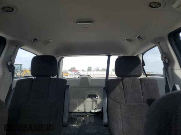 2012 Dodge Grand Caravan SXT z VIN 2C4RDGCG9CR198584, wystawiony jako Copart lot #87287765 z przebiegiem 189 694 mil mil oraz Szkoda całkowita • Salvage title. Historia ofert i sprzedaży dostępna na DreamBid. Obrazek 10.