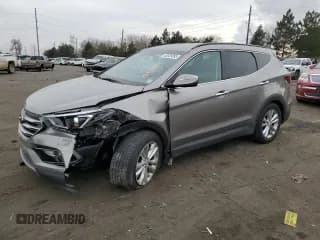 ✅ 2018 Hyundai Santa Fe Limited • VIN: 5XYZUDLA0JG519441 • Лот: 82035893. Опубликован ранее на Copart с пробегом 69 802 миль. Бесплатный доступ к архиву аукционных продаж из США и подробный отчёт об истории автомобиля на DreamBid. Изображение 1.