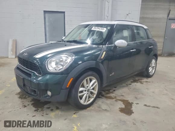 ✅ 2013 MINI Countryman S ALL4 • VIN: WMWZC5C57DWP32208 • Lot: 95294255. Listed on Copart with 124,849 mi. Free auction sales archive from the USA and detailed vehicle history report at DreamBid. Image 1.